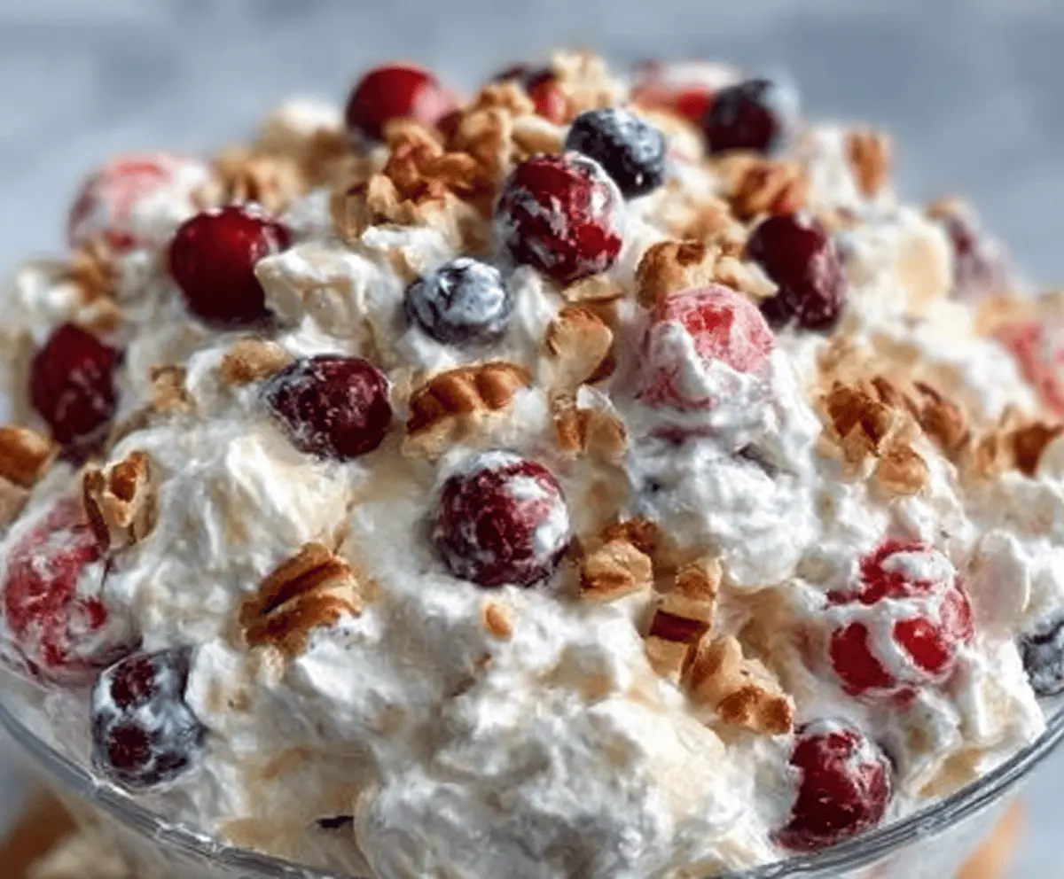 Delicious Easy Holiday Cheesecake Salad with fresh fruit and creamy cheesecake mixture